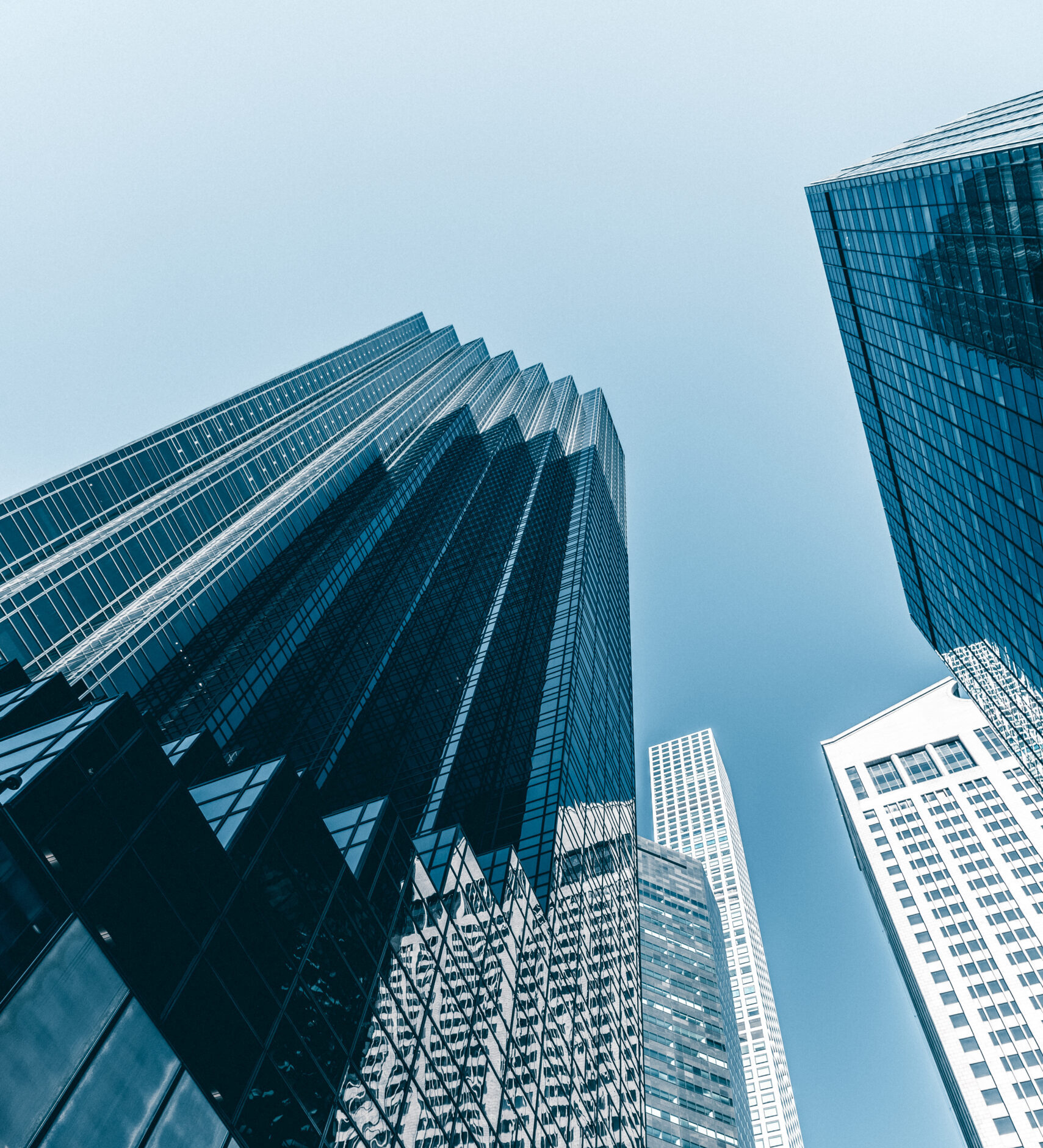 A vertical low angle shot of the buildings of New York